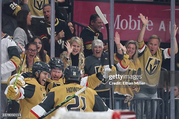 William Karlsson, Kaedan Korczak and Brett Howden of the Vegas Golden Knights celebrate Karlsson's goal against the Colorado Avalanche in the second...