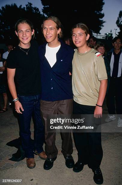 American pop rock band Hanson attend the 'Night at the Net' tennis tournament at the Los Angeles Tennis Center, within the UCLA campus in the...