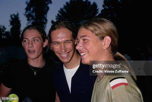 American pop rock band Hanson attend the 'Night at the Net' tennis tournament at the Los Angeles Tennis Center, within the UCLA campus in the...