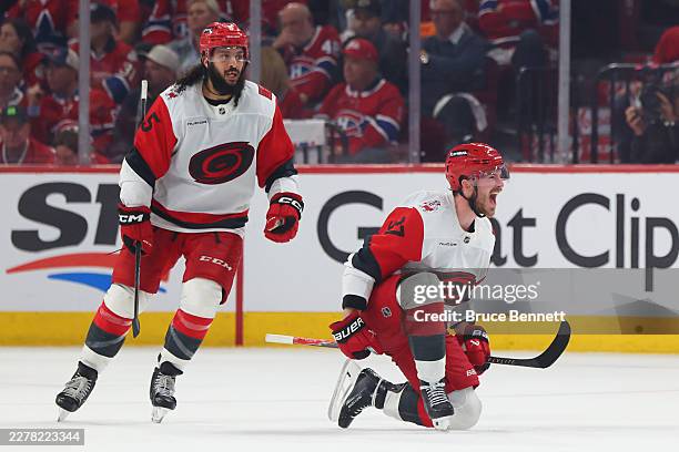 Andrei Svechnikov of the Carolina Hurricanes celebrates after scoring the game-winning goal against the Montréal Canadiens during overtime in Game...