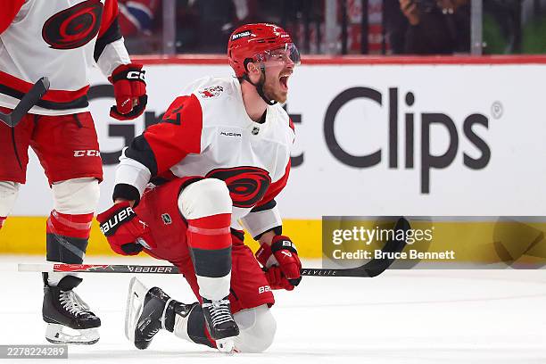 Andrei Svechnikov of the Carolina Hurricanes celebrates after scoring the game-winning goal against the Montréal Canadiens during overtime in Game...