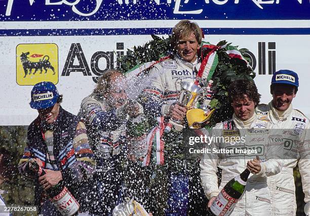 Hans-Joachim Stuck from Germany and Derek Bell from Great Britain, drivers of the Rothmans Porsche Porsche 962C-003 Porsche 935/82 turbocharged...