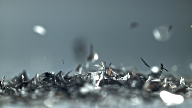 https://media.gettyimages.com/id/2278412078/video/gleaming-metal-shavings-gently-cascade-through-air-in-slow-motion-filmed-on-a-high-speed.jpg?b=1&s=640x640&k=20&c=j25oNPvPs1j1jxMkye9kVX4f8t-FND3F5GUob4VFhTE=