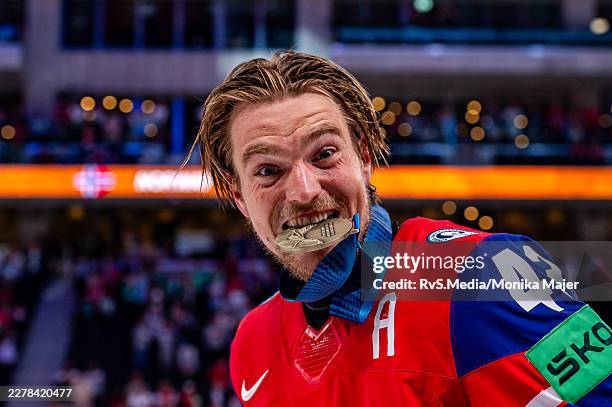 Max Krogdahl of Norway pose for a photo with his Bronze medal during the 2026 IIHF Ice Hockey World Championship Switzerland Bronze medal game...