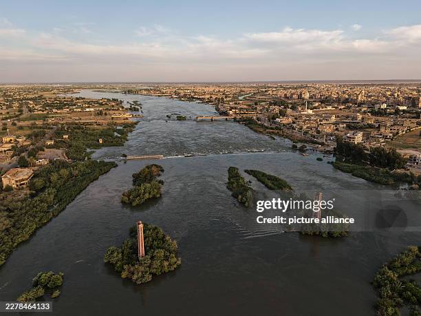 May 2026, Syria, Deir ez-Zur: An aerial view shows the rising water levels on the Euphrates River in Deir ez-Zur. Severe flooding caused by rising...