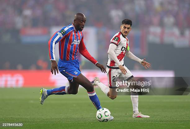 Jean-Philippe Mateta of Crystal Palace is challenged by Oscar Valentin of Rayo Vallecano during the UEFA Conference League Final 2026 match between...