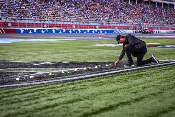 Kurt Busch Roses Hall of Famer Kurt Busch lays roses across a tribute to his late ...