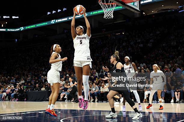 Angel Reese of the Atlanta Dream rebounds the ball against the Minnesota Lynx in the second quarter at Target Center on May 27, 2026 in Minneapolis,...