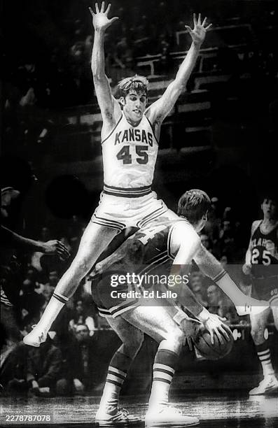 University of Kansas Guard Tom Kivisto jumps to defend against Oklahoma player on February 3, 1973 in Lawrence, Kansas.