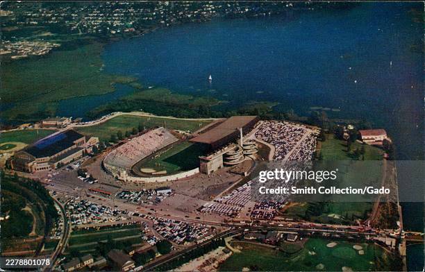 Postcard aerial view of Husky Stadium and Hec Edmundson Pavilion on Lake Washington at the University of Washington, Seattle, Washington, United...