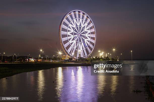 General view of the ferris wheel located on the banks of the Magdalena River in Barranquilla, the Colombian Caribbean coastal city where singer...