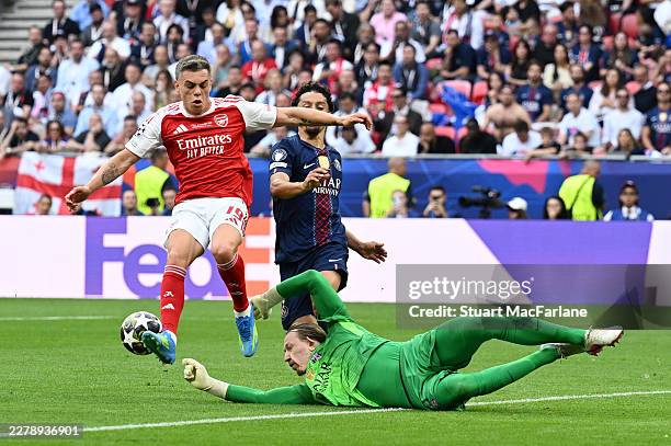 Leandro Trossard of Arsenal is challenged by Matvey Safonov of Paris Saint-Germain during the UEFA Champions League Final 2026 match between Paris...