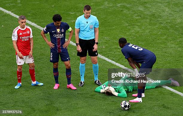 Matvey Safonov of Paris Saint-Germain goes down with an injury during the UEFA Champions League Final 2026 match between Paris Saint-Germain and...