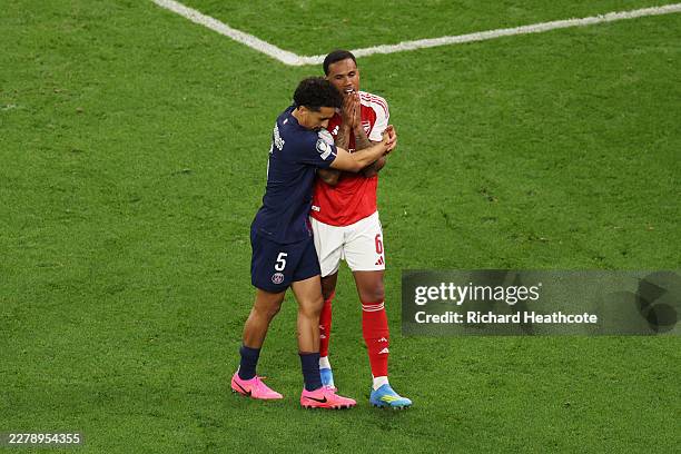 Gabriel of Arsenal is hugged by Marquinhos of Paris Saint-Germain after missing the team's fifth penalty in the penalty shoot out during the UEFA...