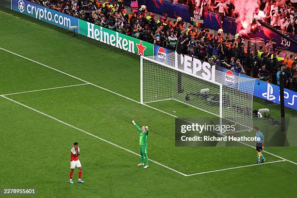 Gabriel of Arsenal looks dejected after missing the team's fifth penalty in the penalty shoot out, as Matvey Safonov of Paris Saint-Germain...