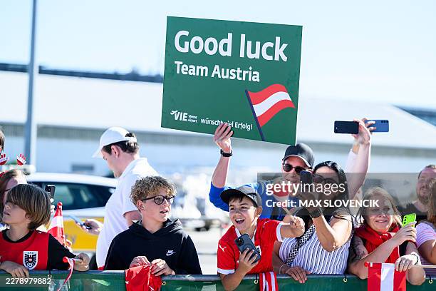 Fans cheer as members of Austria's national football team departed from the Schwechat airport near Vienna, Austria, on June 4 ahead of the FIFA 2026...