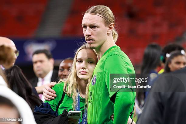Goalkeeper Matvey Safonov and his girlfriend Marina Kondratyuk following the UEFA Champions League Final 2026 match between Paris Saint-Germain and...