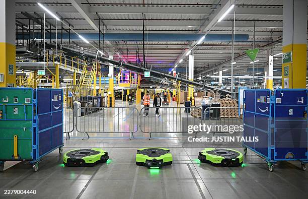Amazon next-generation Proteus robots are pictured working, during the second day of 'Delivering the Future EMEA '26', at Amazon's LCY3 Fulfillment...
