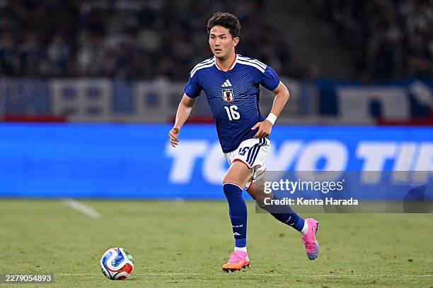 Tsuyoshi Watanabe of Japan controls the ball during the international friendly match between Japan and Iceland at MUFG Stadium on May 31, 2026 in...