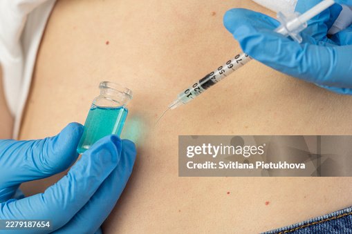 Ghk cu peptide vial pipette subcutaneous belly fold injection syringe hands analog mots c therapy close up view looking away concept of cosmetology, biochemistry, pharmacology Ghk cu peptide vial pipette subcutaneous belly fold injection syringe hands analog mots c therapy close up view looking away concept of cosmetology, biochemistry, pharmacology