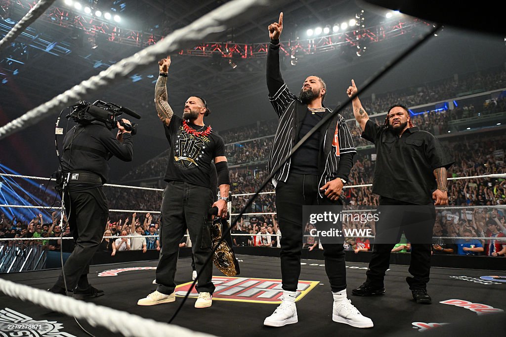 Jacob Monday Roman Reigns, Jimmy Uso and Jacob Fatu look on during Monday Night ...