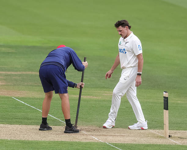 Nathan Smith of New Zealand observes as ground staff attend to the crease during the 1st Rothesay Test Match Day 2 between England and New Zealand at...