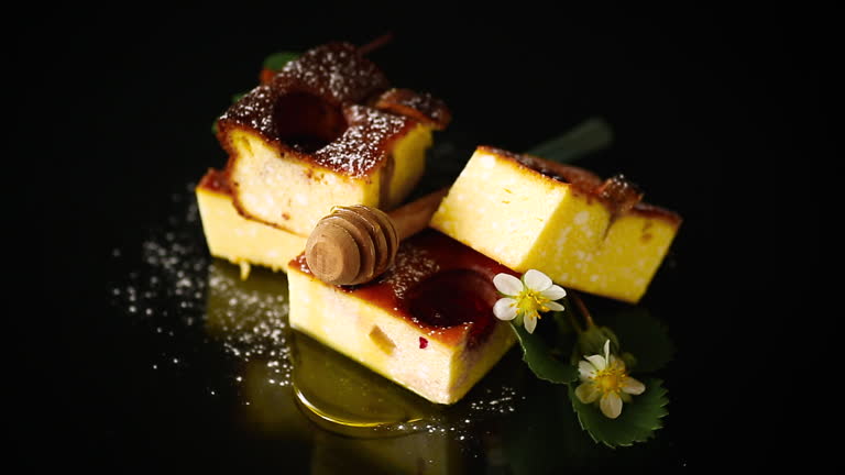 https://media.gettyimages.com/id/2279408290/video/sweet-cottage-cheese-casserole-with-strawberry-filling-on-black-background.jpg?b=1&s=640x640&k=20&c=WIZqJlALWTP4alic0fZRENk4mQKmhcY0SB9WJQPpDqA=