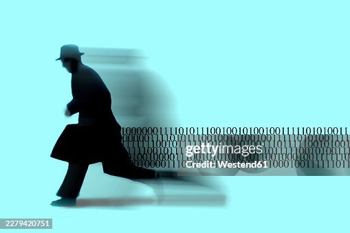 Running silhouette trailing binary code showing cyber crime Running silhouette trailing binary code showing cyber crime