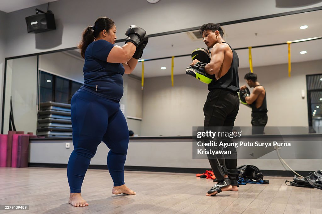 Woman Preparing for Boxing Combination Training