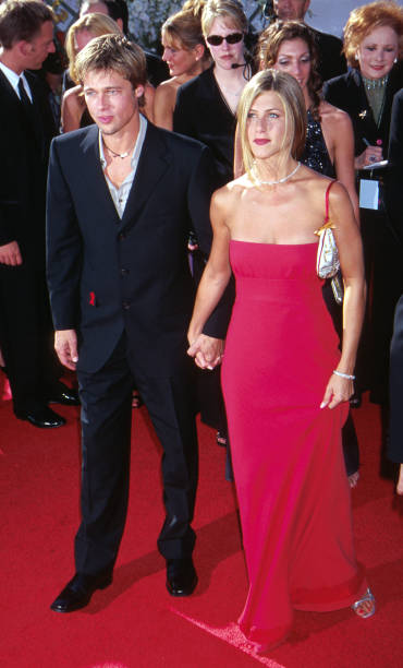 Brad Pitt in Hedi Slimane and Jennifer Aniston in Prada at the 2000 Emmy Awards on September 10, 2000 held in Los Angeles, CA Photo Scott...