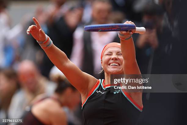 Diana Shnaider celebrates after victory over Aryna Sabalenka in their Women's Singles quarter-final match on Day Eleven of the 2026 French Open at...