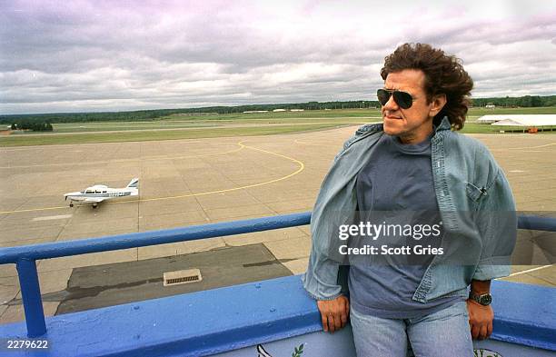 Michael Lang, one of the original founders of Woodstock '69 and the founder of Woodstock '99, overlooks the site of this years festival to be held at...