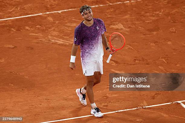 Flavio Cobolli of Italy celebrates match point against Felix Auger-Aliassime of Canada during their Men's Singles quarter-final match match on Day...