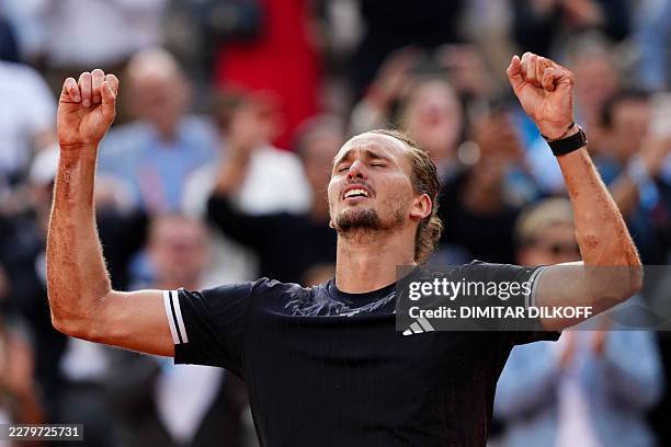 Germany's Alexander Zverev celebrates after winning the men's final singles match against Italy's Flavio Cobolli on day 15 of the French Open tennis...