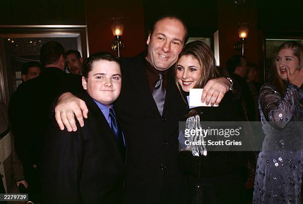 Robert Iler, James Gandolfini, and Jamie-Lynn Sigler arrive for the premiere of the HBO series The Sopranos, now in its second season, at the...