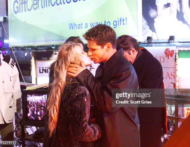 Jessica Simpson and Nick lachey from 98 Degrees celebrate the turning of the century at midnight New Year's Eve on the 'MTV 2 Large' stage in Times...