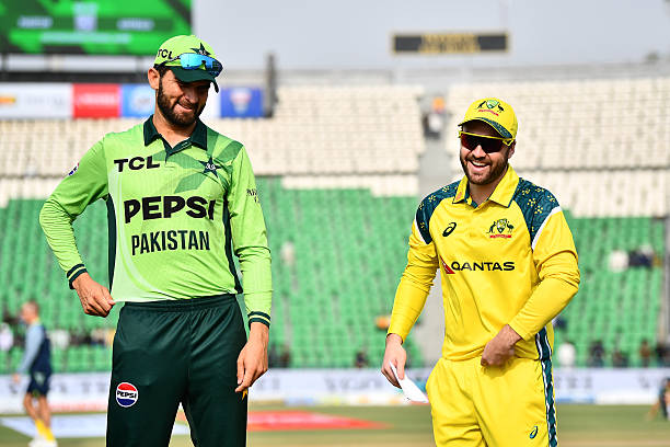 Josh Inglis of Australia and Shaheen Shah Afridi of Pakistan interact ahead of the coin toss during game three of the One Day International series...
