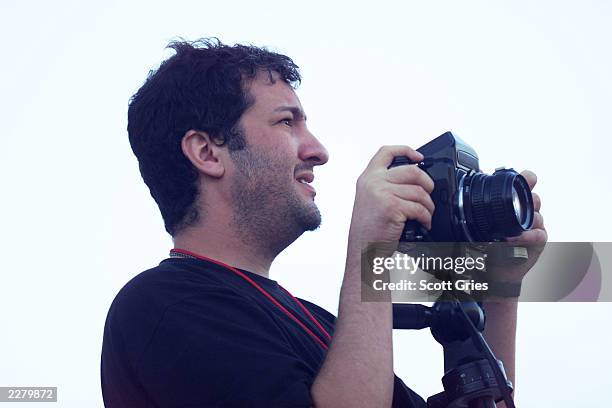 Controversial artist/photographer Spencer Tunick at Woodstock 99 in Rome, New York where an estimated 100 people posed nude for him. The Woodstock 99...