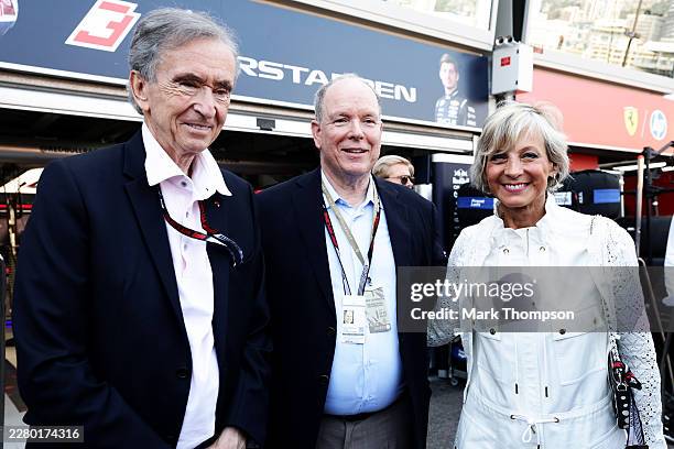 Prince Albert II of Monaco and Bernard Arnault, CEO of LVMH in the Paddock during qualifying ahead of the F1 Grand Prix of Monaco at Circuit de...