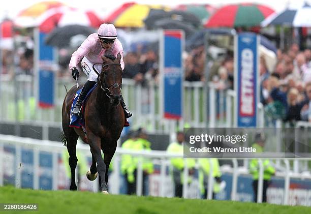 Ronan Whelan rides Christmas Day to victory in The Betfred Derby during The Betfred Derby Day at Epsom Downs Racecourse on June 06, 2026 in Epsom,...