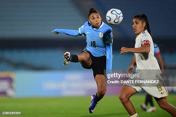 Uruguay's forward Wendy Carballo and Venezuela's midfielder Gabriela Garcia fight for the ball during the CONMEBOL Nations League Women football...