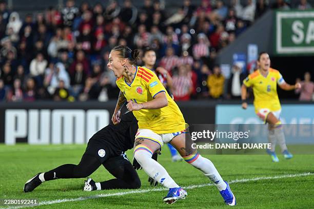 Colombia's defender Ana Guzman celebrates scoring her team's fourth goal during the CONMEBOL Nations League Women football match between Paraguay and...