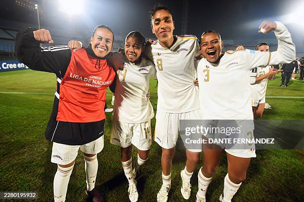 Venezuela's players celebrate qualification for the intercontinental playoffs for the 2027 FIFA Women's World Cup at the end of the CONMEBOL Nations...
