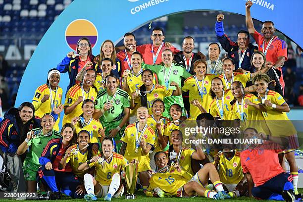 Colombia's team members celebrate with the trophy and their medals after winning the CONMEBOL Nations League Women at the end of the football match...