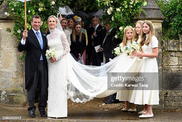 Peter Phillips and Harriet Sperling depart from their Royal wedding alongside bridesmaids Isla Phillips, Savannah Phillips and Georgina Sperling at...