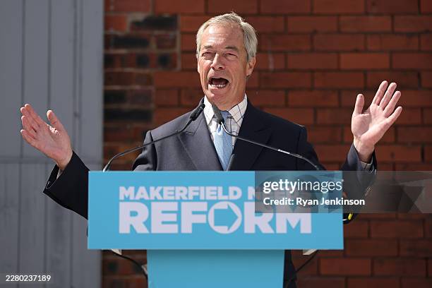 Reform UK Leader Nigel Farage speaks at a press conference for the Reform candidate Robert Kenyon ahead of the Makerfield by-election on June 10,...