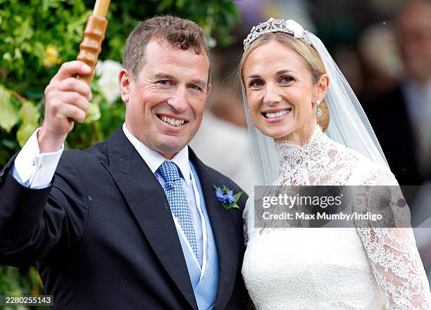 Peter Phillips and Harriet Sperling depart All Saints' Church following their wedding on June 6, 2026 in Kemble, England. Peter Phillips, son of...
