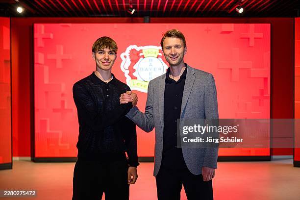 Kennet Eichhorn and Sporting Director Simon Rolfes of Leverkusen posing for a photo on June 10, 2026 in Leverkusen, Germany.