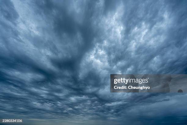 dark stormy sky with heavy clouds - ominous stock pictures, royalty-free photos & images