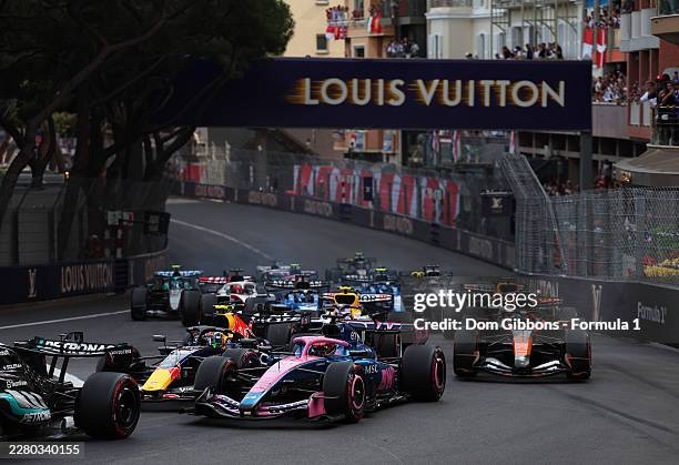 Pierre Gasly of France driving the Alpine F1 A526 Mercedes leads Isack Hadjar of France driving the Oracle Red Bull Racing RB22 Red Bull Ford and...